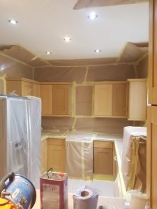 Kitchen cupboards before sprayed